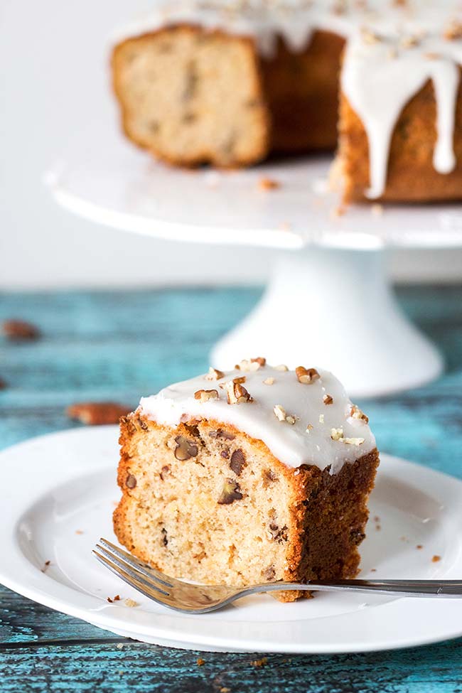 This Pineapple Pound Cake with pecans is made with canned crushed pineapple so it can be enjoyed all year long! | yummyaddiction.com