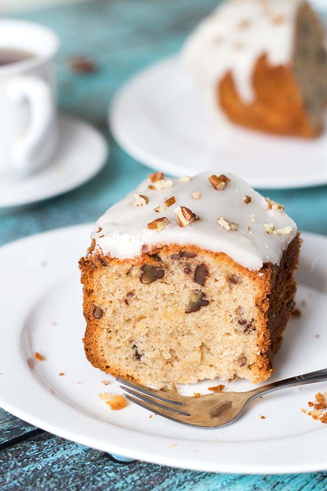 This Pineapple Pound Cake with pecans is made with canned crushed pineapple so it can be enjoyed all year long! | yummyaddiction.com