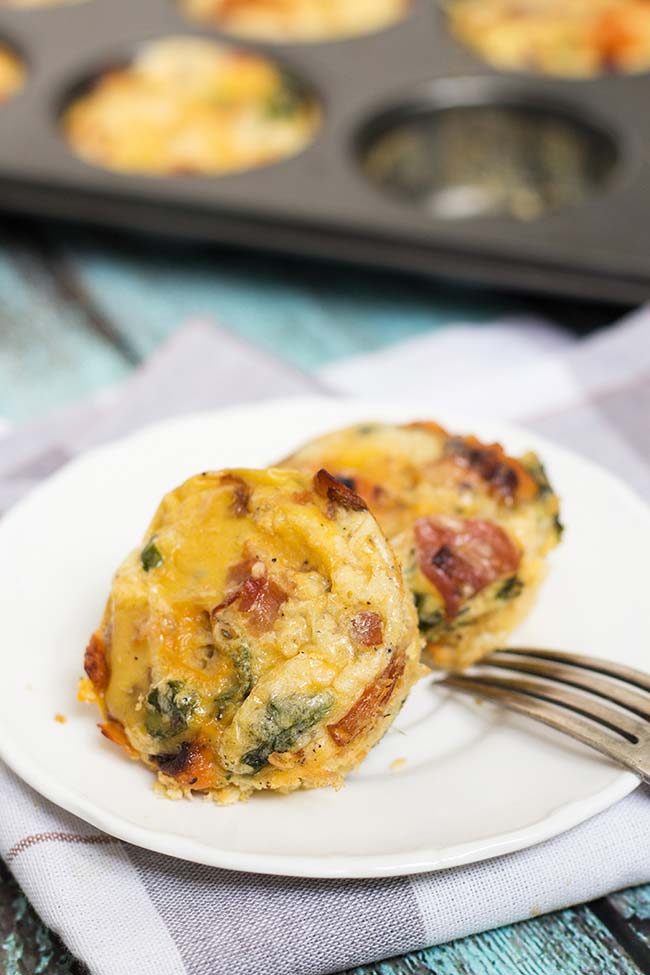 These individual sized frittata muffins are filled with sweet potatoes, spinach and prosciutto. Perfect for breakfast! | yummyaddiction.com