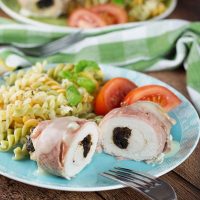 These Bacon Wrapped Chicken Breasts are stuffed with prunes and served with a simple and delicious chicken gravy. Quick and easy to make - a perfect weeknight dinner! | yummyaddiction.com
