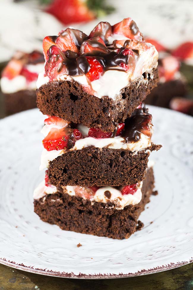 Close-up shot of strawberry brownies stacked on top of each other