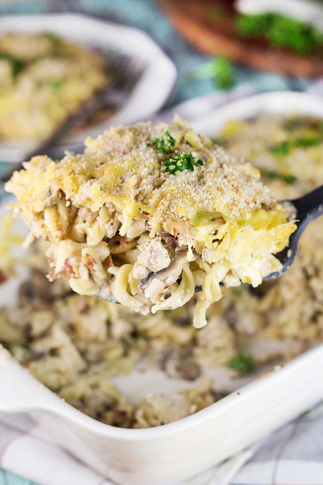 This Ground Turkey Casserole is packed with mushrooms, bacon, pasta, and other goodness. Filling and comforting, it makes a perfect weeknight dinner! | yummyaddiction.com