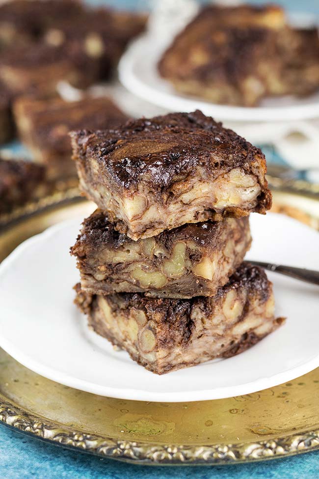 These Chocolate Banana Bread Brownies also feature walnuts and are comforting, dense, and super moist! They are guaranteed to make any day better! | yummyaddiction.com