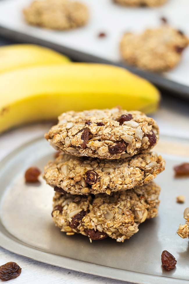 These Instant Oatmeal Cookies make a perfect healthy breakfast or snack. Packed with bananas, sunflower seeds, raisins, and coconut, they are also easy and quick to make! #glutenfree #vegan | yummyaddiction.com