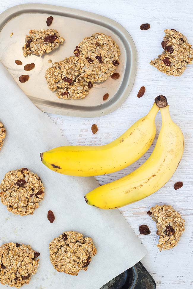 These Instant Oatmeal Cookies make a perfect healthy breakfast or snack. Packed with bananas, sunflower seeds, raisins, and coconut, they are also easy and quick to make! #glutenfree #vegan | yummyaddiction.com