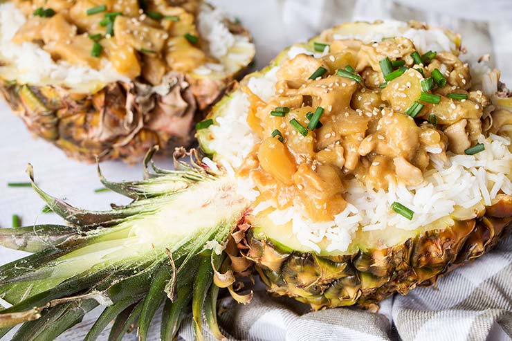 Take your dinner to another level with these Teriyaki Chicken Pineapple Bowls! Beautiful and crazy delicious, these are guaranteed to get many compliments from your friends and family! | yummyaddiction.com