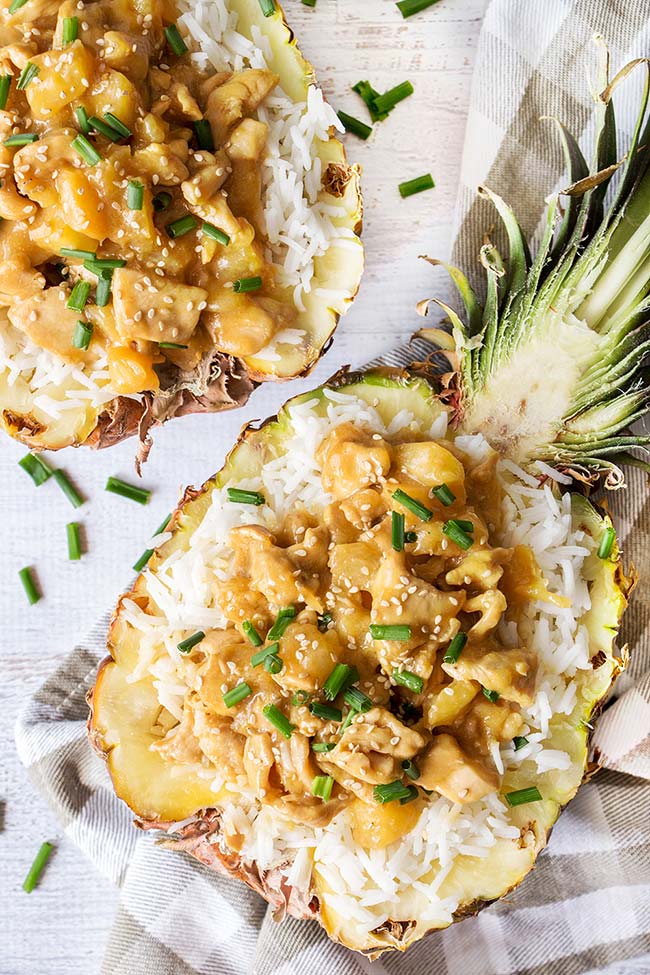 Take your dinner to another level with these Teriyaki Chicken Pineapple Bowls! Beautiful and crazy delicious, these are guaranteed to get many compliments from your friends and family! | yummyaddiction.com