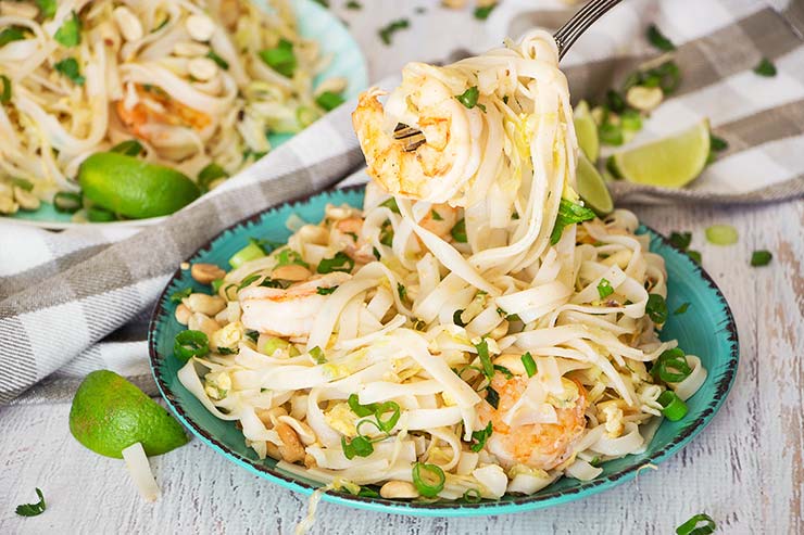 This One Pot Pad Thai is way better than any takeout you will ever have! Packed with veggies, peanuts, and flavored with a fantastic sauce, it makes a perfect weeknight dinner! | yummyaddiction.com