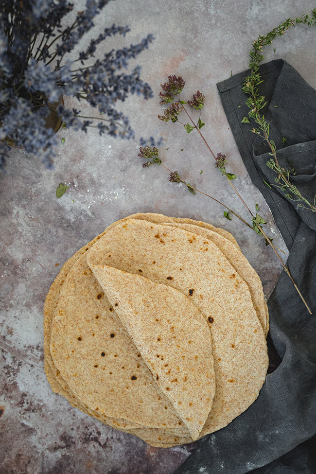 Pile of homemade whole-wheat tortillas