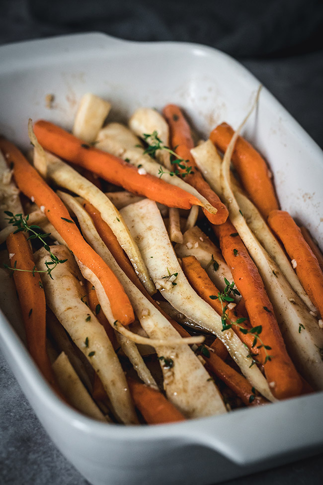 Roasting tray of parsnips and carrots