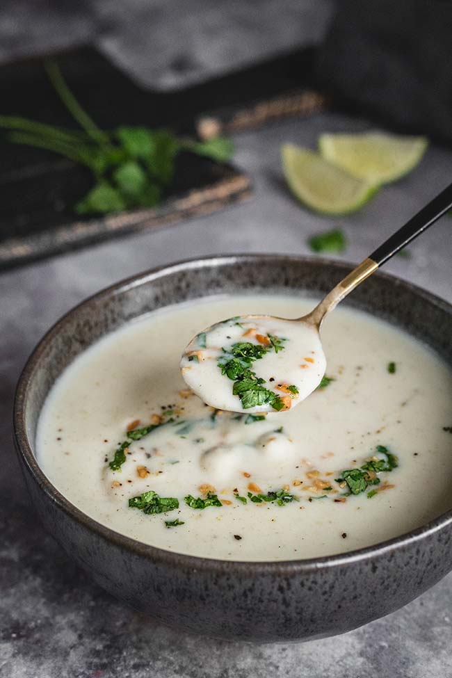 A spoonful of coconut cauliflower soup