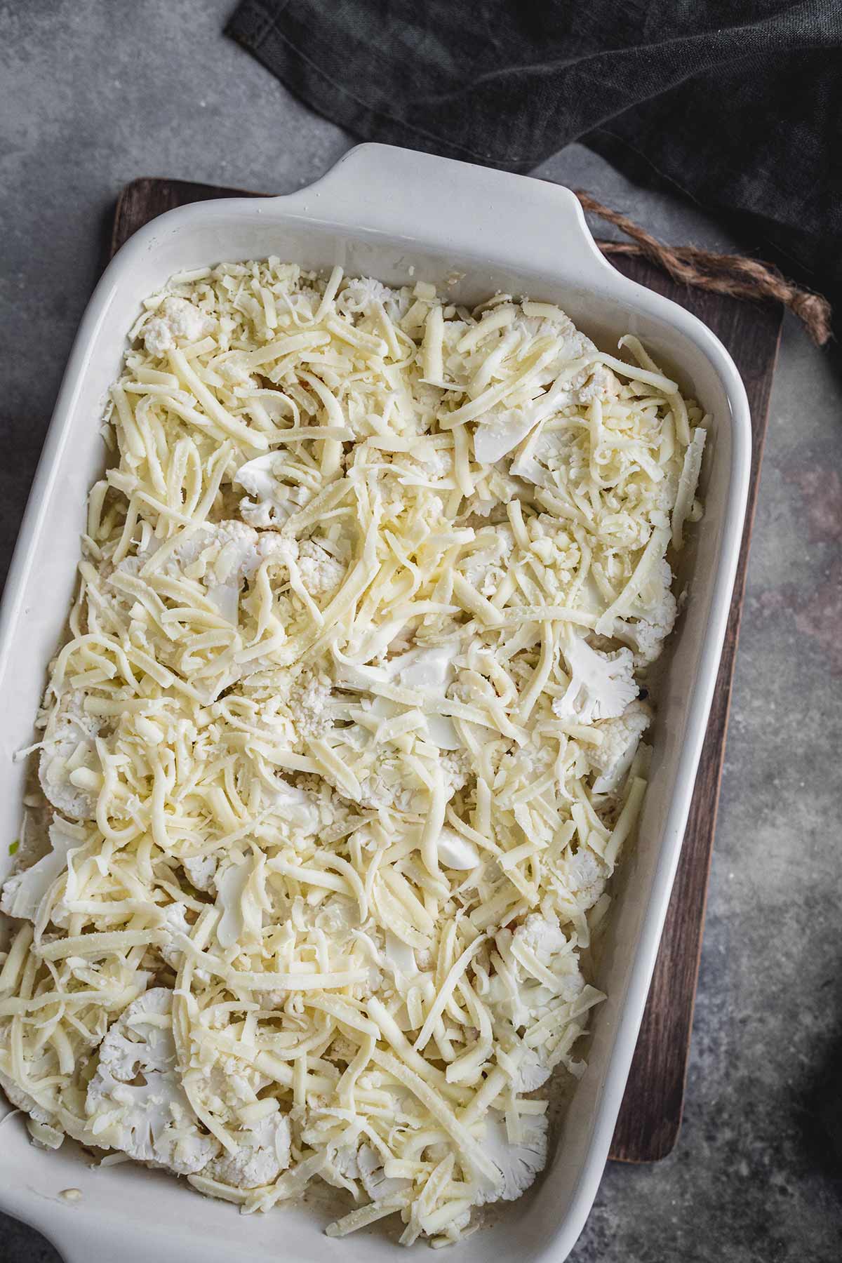 Chicken and cauliflower casserole in a dish before baking