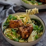 Ramen noodle soup with salmon chunks