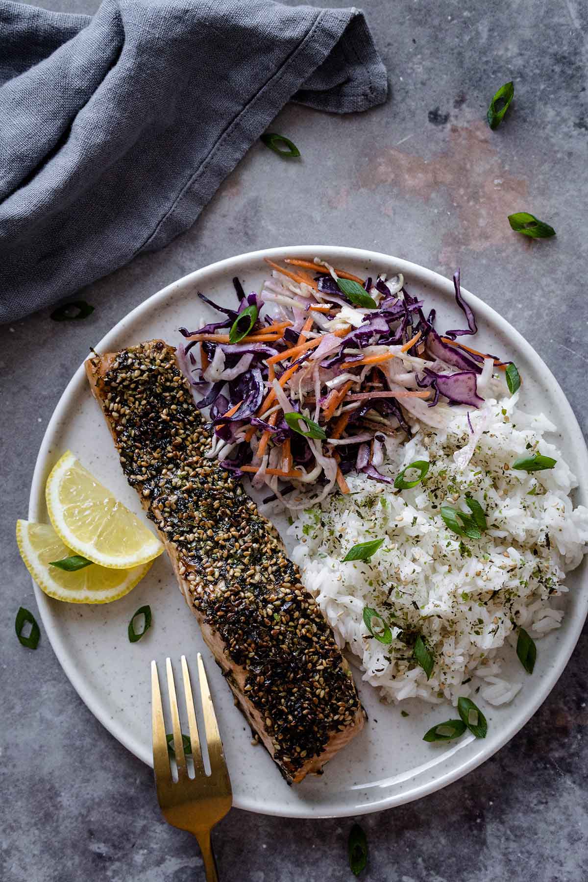 Furikake crusted salmon served with coleslaw and rice