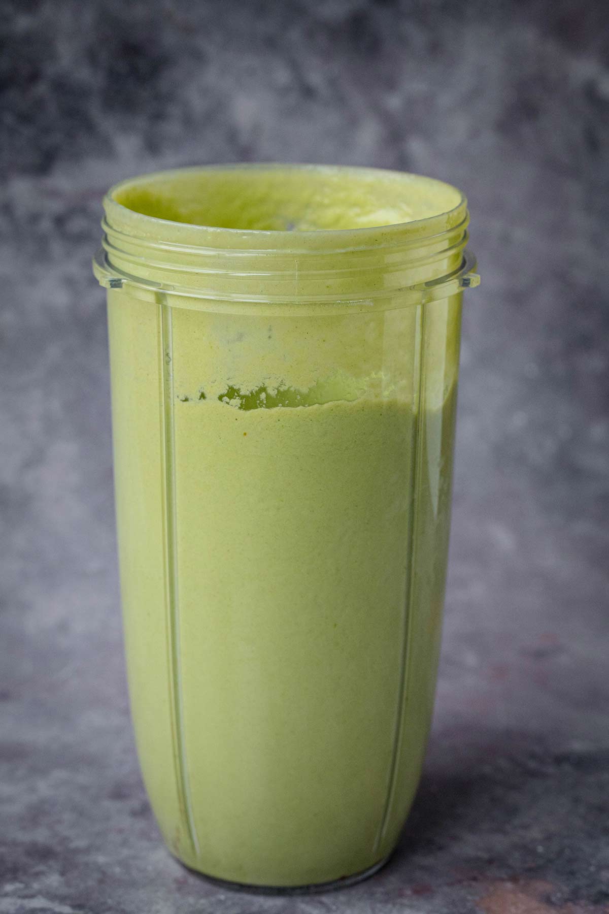 Green smoothie in a blender