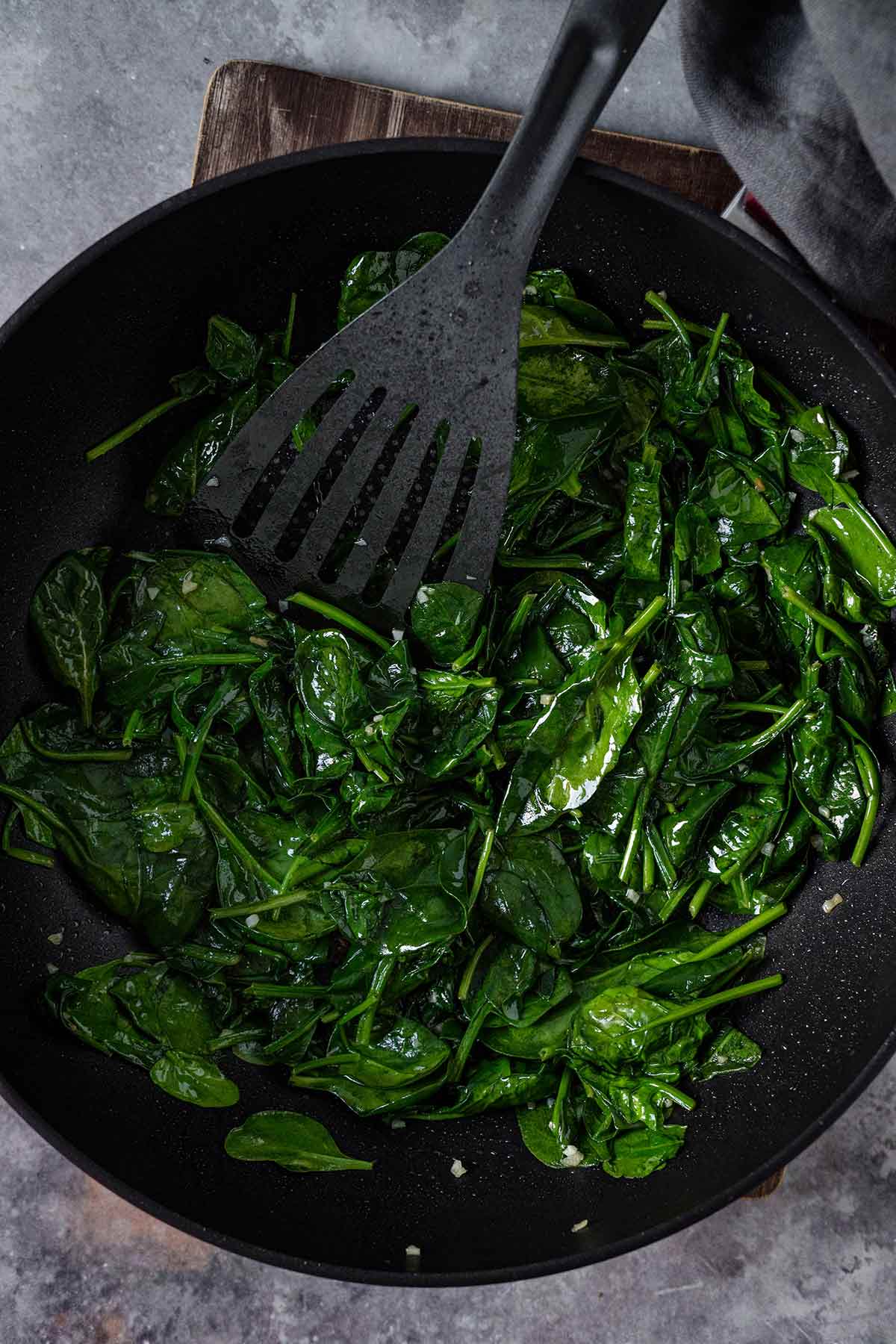 Sauteed spinach in a skillet